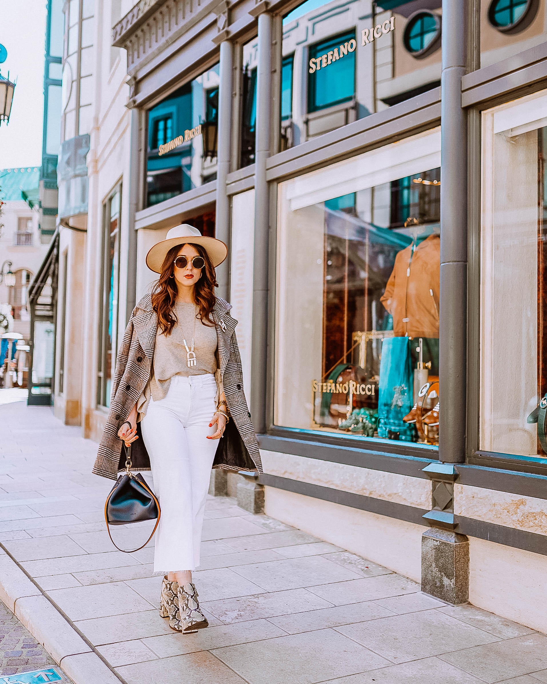 Girl walking down Rodeo Drive