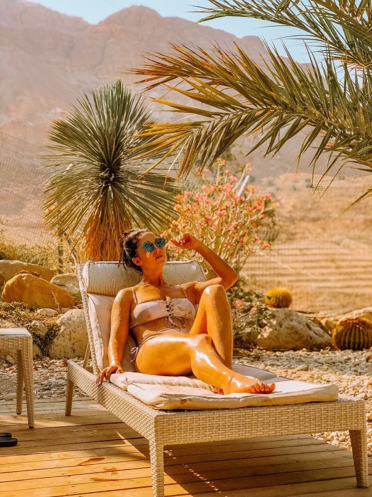 girl on lounge chair at Ein Gedi Spa