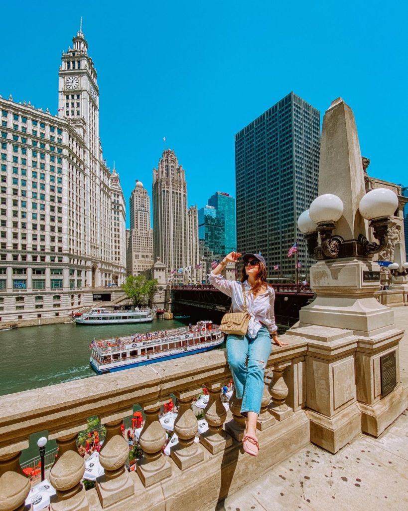 Girl sitting on Chicago riverwalk